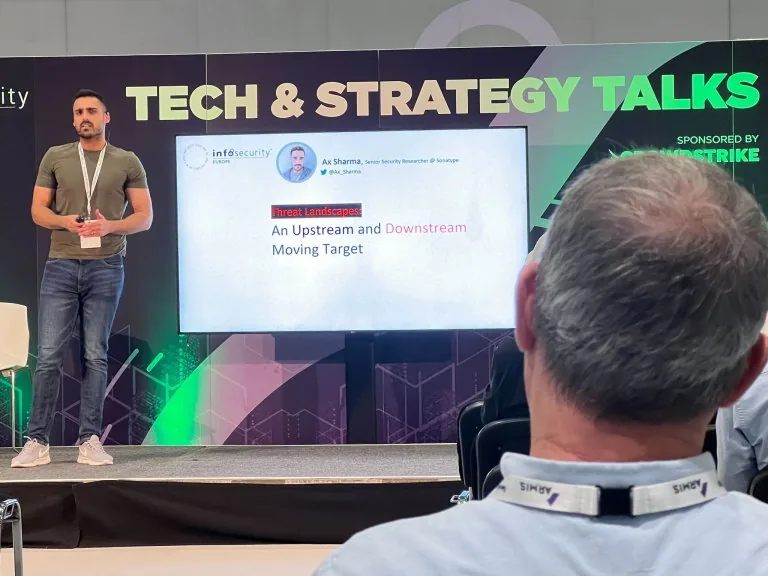 Ax Sharma on stage at Infosecurity Europe London delivering a Tech & Strategy talk